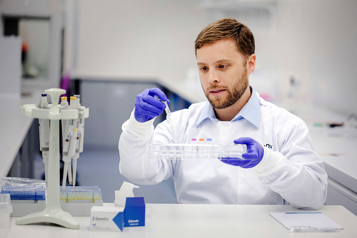 Matthew Marini, Quality Control Manager, sets up a Polymerase Chain Reaction (PCR) experiment. Photo courtesy of SpeeDx